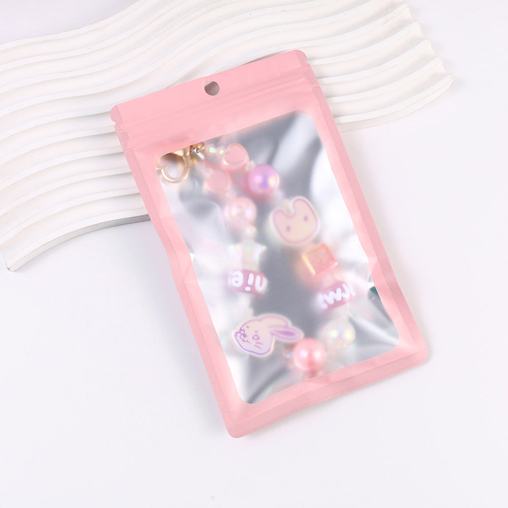 NEWJEANS CELL PHONE PENDANT